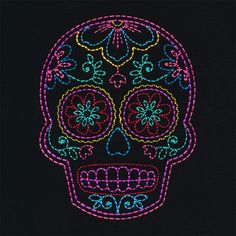 a neon colored sugar skull on a black background