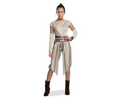 a woman dressed in star wars costume standing with her hands on her hips and looking at the camera