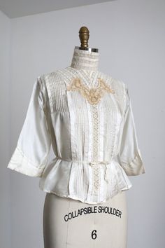 "Absolutely gorgeous silk & lace blouse from the 1910s. Buttons and hooks & eyes up the back.  Label: none  Measurements: { xsmall } Bust: 35\"  Length: 21\" Sleeve Length: 14.5\" Collar: maybe a little shy of 14\" around the neck Condition: excellent with minor signs of general wear - sold as found. ☆Shop more☆ http://www.trunkofdresses.com/" Formal Silk Blouse With Lace Trim, Silk Blouse With Lace Trim For Formal Occasions, Victorian Fitted Blouse For Vintage Fashion, Victorian Lace Blouse For Daywear, Fitted Victorian Top With Lace Work, Vintage Cream Blouse For Wedding, Victorian Blouse With Lace Collar For Wedding, Vintage Lace Trim Wedding Blouse, Victorian Wedding Blouse With Lace Collar