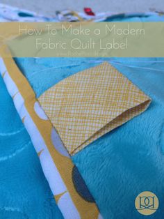 how to make a modern fabric quilt label on the back of a blue couch cushion