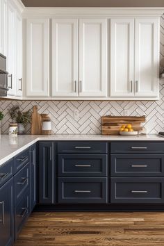 a kitchen with blue cabinets and white countertops is pictured in this image, there are wooden cutting boards on the counters