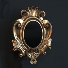 an ornate gold framed mirror on a black wall