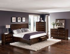 a bedroom scene with focus on the bed and dresser