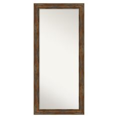 a mirror that is sitting on top of a white wall with a brown border around it