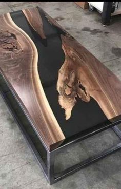 a coffee table made out of wood and metal