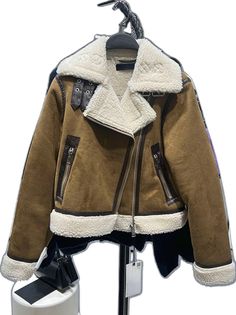 Trendy Winter Biker Jacket With Zipper Closure, Trendy Biker Jacket With Zipper For Winter, Trendy Biker Jacket With Zipper Closure For Winter, Trendy Khaki Leather Jacket For Winter, Leather Biker Jacket With Faux Fur Lining, Brown Leather Jacket With Zipper For Cold Weather, Beige Long Sleeve Biker Jacket For Fall, Beige Leather Biker Jacket For Fall, Brown Biker Jacket With Zipper For Winter