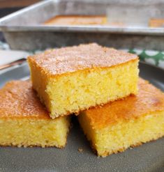 three pieces of cornbread on a plate