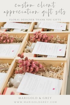 a wooden box filled with lots of cards and paper on top of each other that says congratulations client appreciation gift sets