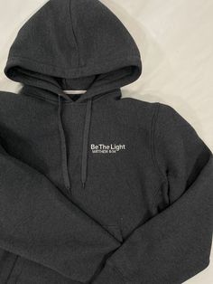 Hi Friends! This is a very well made, durable, high quality hoodie that will last for years to come. keeps the wind and cold out very well. you will fall in love with the quality.  Be the light Mathew 5:14  Embroidered Made in Indonesia  Sport-tek 80%cotton 20 % polyester  True to size Mathew 5, Faith Apparel, Faith Clothing, Be The Light, Christian Apparel, Christian Clothing, Very Well, The Wind, The Light