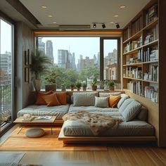 a living room filled with lots of furniture and bookshelves next to a window