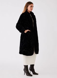 • Esmaee In the Peak Coat • Plush faux fur fabrication • Shawl collar • Press stud opening • Long sleeve • Side pockets • Calf length • Fully lined Style No: 4391.5680 Content: 100% Polyester Lining: 100% Polyester Model height: 180cm / 5' 11in | Model wears Size XS Also available in Cream + Black Oversized Black Outerwear With Faux Fur Trim, Chic Black Shearling Fur Coat, Ambiance Outerwear Black Faux Fur, Black Fur Coat With Padded Collar, Luxury Black Faux Fur Coat, Sale Promotion, Black Xs, The Peak, Press Studs