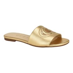 PRICES MAY VARY. The Tashia slide sandal from GUESS is comfortable enough for a day exploring the town and stylish enough for a dressed up summer look. The logo cutout detailing gives a standout look to this sandal. Est. 1981, Guess is a global lifestyle brand and a symbol of a young, adventurous lifestyle. Almond/Open Toe ; Slip-on Closure Man Made Upper 0.31" heel height Adventurous Lifestyle, Fashion Sandals, Summer Look, Lifestyle Brand, Lifestyle Brands, Flat Sandals, Slide Sandals, Summer Looks, Women's Shoes Sandals