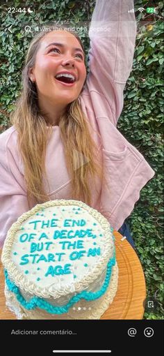 a girl is celebrating her birthday with a cake