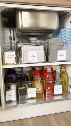 an open cabinet filled with lots of different items