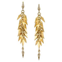 Trickling Icicle Dangle Earrings feature Karma El Khalil's signature pyramid spike motif with white diamond studs and clusters of solid yellow gold pyramid spikes dangling down and finished at the tips with diamonds. 18k Yellow Gold : 16.62g White Diamonds : 0.22cts Includes 18k Yellow Gold push closure earring backings From Karma El Khalil's Echo Collection Starburst Earrings, Natural Gold, Pearl Earrings Dangle, Yellow Gold Earring, Rose Cut Diamond, Solid Yellow, Long Earrings, Chandelier Earrings, Diamond Studs