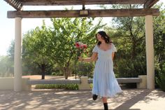 Floral outside photo shoot with doc martens White Dress, White