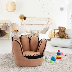 a child's room with toys and stuffed animals on the floor, including a teddy bear