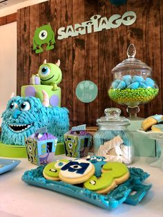 an assortment of cookies and treats on a table at a children's birthday party