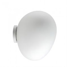 a white light that is on the side of a wall or ceiling mounted fixture,