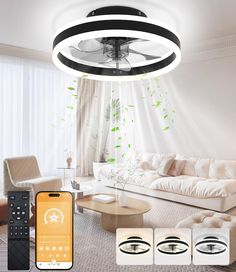 an image of a living room setting with remote controls on the table and ceiling fan