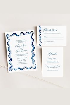 the wedding stationery is laid out and ready to be used as an additional piece of paper