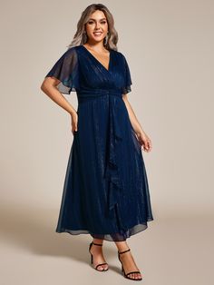 Elevate your wedding guest attire with this chic and sophisticated plus size V-neck A-line dress. The short sleeves offer comfort and style, while the ruffle hem adds a touch of feminine charm. Crafted from silver crinkle fabric, this dress shimmers elegantly under the lights, making it perfect for any special occasion. Navy Blue Dress For Wedding Guest Plus Size, Navy Blue Wedding Guest Dress Plus Size, Plus Size Blue Dress Wedding Parties, Plus Size Wedding Guest Dresses Blue, Blue V-neck Bridesmaid Dress For Wedding Guest, Ever Pretty, Affordable Dresses, Guest Attire, Wedding Attire Guest