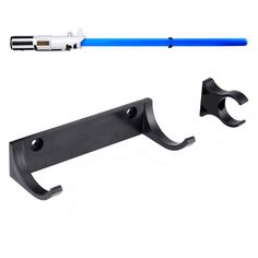 PRICES MAY VARY. Perfect Solution for Lightsaber Display: This horizontal lightsaber wall mount comes with 1 plastic hilt hooks and 1 plastic blade clips which will hold your saber securely and beautifully. Easy to Use: 1. Screw the hook and clip into the wall. 2. Put the hilt into the hook, and slip the blade into the clip. Hardware included. Sturdy: Thick plastic hook supports the weight of lightsaber. Durable plastic clip controls the blade not to fall. The kit is sturdy enough and can last f Lightsaber Holder, Lightsaber Wall Mount, Lightsaber Display, Plastic Clips, Plastic Hooks, Display Rack, Eyeglass Case, Lightsaber, Light Up