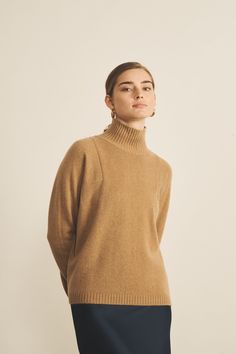 Our Charlotte turtleneck cashmere sweater for women provides great insulation against the cold all the while remaining stylish. With its slightly oversized and loose fit, it is meant to be worn both on days off and with casual outfits in the countryside, and also in a more sophisticated manner for dinners in town. An iconic and timeless piece. Charlotte’s fashion tip: “I love this textured and sophisticated turtleneck. Perfect with baggy jeans for a casual look in between seasons, or under a nice cashmere coat during chilly days in winter. To be a “matchy-matchy” couple with your partner, discover also Charles, the sustainable cashmere turtleneck sweater for men, available in matching colourings.” Wool Funnel Neck Polo Sweater For Fall, Wool Polo Sweater With Funnel Neck For Fall, Merino Wool Long Sleeve Turtleneck For Fall, Long Sleeve Merino Wool Turtleneck For Fall, Fall Merino Wool Turtleneck For Workwear, Merino Wool Turtleneck For Fall Workwear, High Neck Cashmere Sweater For Work, Beige Fine Knit Winter Turtleneck, Winter Beige Fine Knit Turtleneck