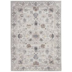 a rug with an ornate design in grey and beige colors on a white background,