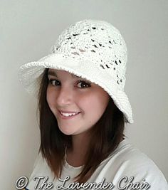 a woman wearing a white crochet hat