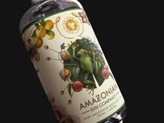 an amazonian gin company bottle on a black background