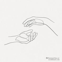 two hands reaching for each other over a piece of paper