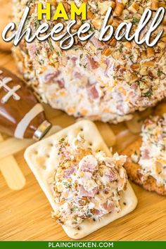 a football and crackers on a wooden table