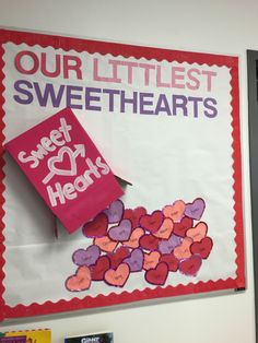 a bulletin board with hearts on it and the words our littlest sweethearts written in pink