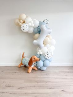 🐾PAWTY TIME Create a delightful and playful atmosphere with this Puppy-Themed Balloon Garland Kit, perfect for celebrating any puppy lover's special occasion! This charming kit features a mix of soft, pastel-colored balloons in fog blue, white sand, and milky white bringing a warm, adorable vibe to your event. The garland also includes paw print balloons to add an extra touch of whimsy and puppy love. 🐾To elevate the fun, the kit comes with ADD-ON foil balloons in the shape of a dachshund dog foil balloon and a bone foil balloon making it perfect for pets or kids birthdays, baby showers, or any celebration that needs a little canine-inspired charm. Whether you're decorating for a puppy-themed party or just celebrating your love for furry friends as a dog lover, this balloon garland kit w