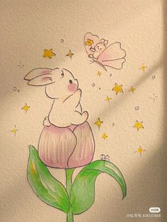 a drawing of a rabbit sitting on top of a flower