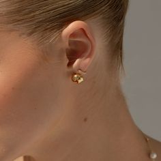 Say hi to our Iris earrings, your new favourite studs that effortlessly blends the everyday with elegance and sophistication! They're meticulously crafted in a high-shine 18ct gold, guaranteeing a sparkle to turn heads wherever you go.  Let it be a treasured addition to your collection, pair them with a chic evening gown or your favourite jeans and let them take you from day to night.  Delivered in our handcrafted logo-stamped velvet pouch and luxury gift box. 18ct Gold plated on brass  Caring f Refined 14k Gold Earrings For Gift, Refined 14k Gold Earrings As Gift, Refined Sterling Silver Earrings For Gift, Refined Gold Earrings For Anniversary, Refined Gold Jewelry With Matching Earrings, Minimalist Drop Earrings For Everyday Luxury, Elegant Tarnish Resistant Huggie Pearl Earrings, Minimalist Luxury Drop Earrings For Everyday, Elegant Tarnish-resistant Huggie Pearl Earrings