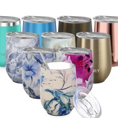 thermos cups are lined up in different colors and designs, with lids on them