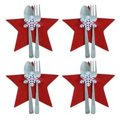 four forks and two spoons decorated with snowflakes on red paper star shaped napkins