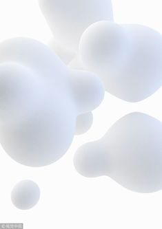 several white bubbles floating in the air on a white background with no one around them