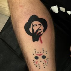 a man's arm with a tattoo on it that has a drawing of a person wearing a mask