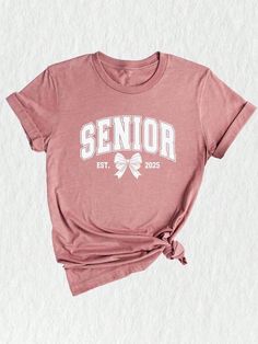 Celebrate your senior's journey with this vibrant and stylish Class of 2025 T-shirt!  Whether you're a senior mom or a proud teacher, this shirt is the perfect way to show your support for the graduating class. Designed with a colorful print, this shirt features the words "Senior 2025" in bold, eye-catching font.  It also includes a unique design element that incorporates the class year and graduation cap, creating a memorable and distinctive look. This shirt is not just for seniors - it's also Plant Texture, Class Of 2025, Suede Leather Shoes, School Tees, Graduation Shirts, Geometric Graphic, Gift Cute, Stylish Shirt, Shirt Fits