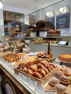 a bakery filled with lots of different types of pastries