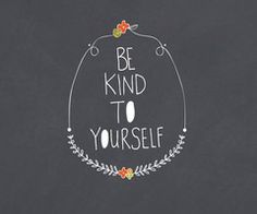 a chalkboard with the words be kind to yourself written on it