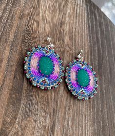 Ethnic Style Earrings. I love this style!  The designs are the result of my creativity. I respect all ethnic cultures of the world from which I draw inspiration. Whenever a particular nation or tribe inspires any piece of my jewelry, I always state that it is my source of inspiration. Handmade Southwestern Green Earrings, Traditional Purple Beaded Earrings For Festivals, Southwestern Green Earrings With Colorful Beads, Southwestern Style Green Earrings With Colorful Beads, Handmade Southwestern Green Beaded Earrings, Green Southwestern Beaded Earrings Gift, Green Southwestern Beaded Earrings For Gift, Southwestern Green Beaded Earrings For Gift, Handmade Purple Earrings For Festive Occasions