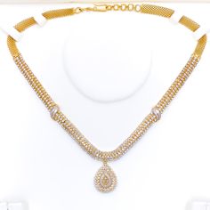 This exquisite 18k gold set, weighing 48.3 grams, features an opulent leaf-adorned design adorned with dazzling diamonds. The yellow gold finish enhances its luxurious appeal, making it perfect for any special occasion. The set includes a necklace with a total diamond weight of 7.47 carats, featuring F-G color and VS quality diamonds in round and tapered baguette shapes. The necklace has a length of 16.5 inches with a 1-inch drop length, adjustable 1-inch links, and a secure hook lock. The match Lock Style, Diamond Set, Gold Set, Quality Diamonds, A Necklace, Matching Earrings, Diamond Shapes, Gold Finish, Timeless Beauty