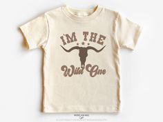 Introducing our super cute Western Theme birthday t-shirts, for a boy or girls' wild one western birthday party. These shirts are high quality and made with 100% soft ringspun cotton for very comfortable wear.   NB: We have multiple options for Mom and Dad in the listings drop-down menu, please double-check you chose the correct one. The Rabbit Skins NATURAL infant tee sizes 6, 12, 18, and 24 months are slightly darker than the Bella Canvas toddler, youth, and adult shirts. We currently do not have the bodysuit in the natural color. HOW TO ORDER 1. Select the color and size/name from the drop-down menu and add it to the cart 2. Repeat the process if you want to order more shirts 3. If you want a custom shirt, please select that from the menu and add the name to the personalization box DELI Wild One Western Birthday, Western First Birthday, Cowboy Family, Farm 1st Birthday, Rodeo Tshirt, Western Birthday Party, First Birthday Shirt, My First Rodeo, Western Birthday