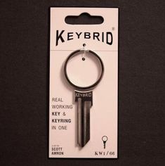 a key ring with the words keybird on it