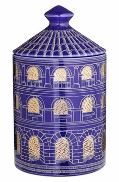 a blue jar with an ornate design on it