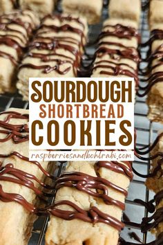 chocolate drizzled shortbread cookies on a cooling rack with the words sourdough shortbread cookies